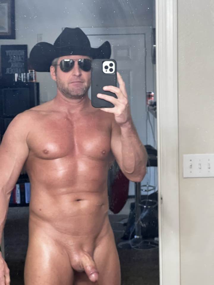 Naked Cowboy with wearing Aviators